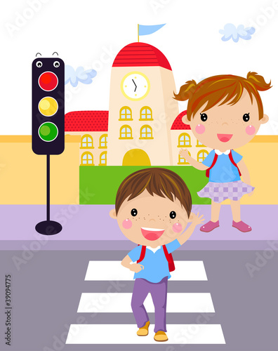 Two children use a cross walk to cross the street
