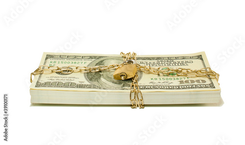 Stack of US 100 dollar bills chained and locked