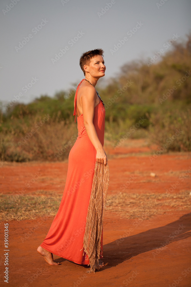 Beautiful girl dressed terracotta dress Beautiful girl dressed terracotta dress