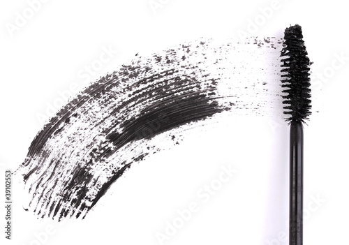 Black mascara brush stroke isolated on white photo