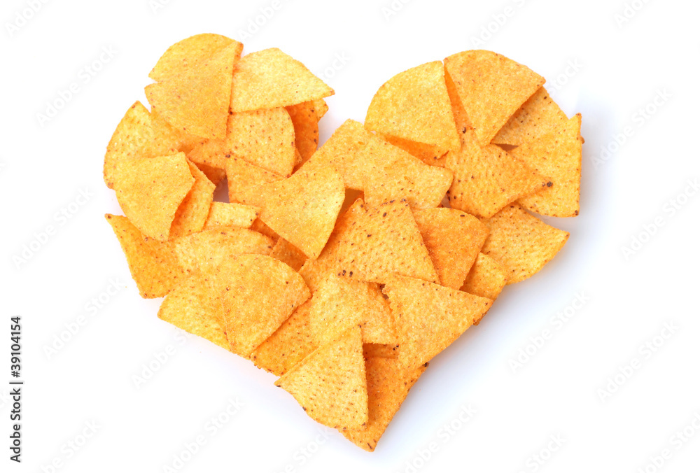Delicious potato chips heart shape isolated on white Delicious potato chips heart shape isolated on white