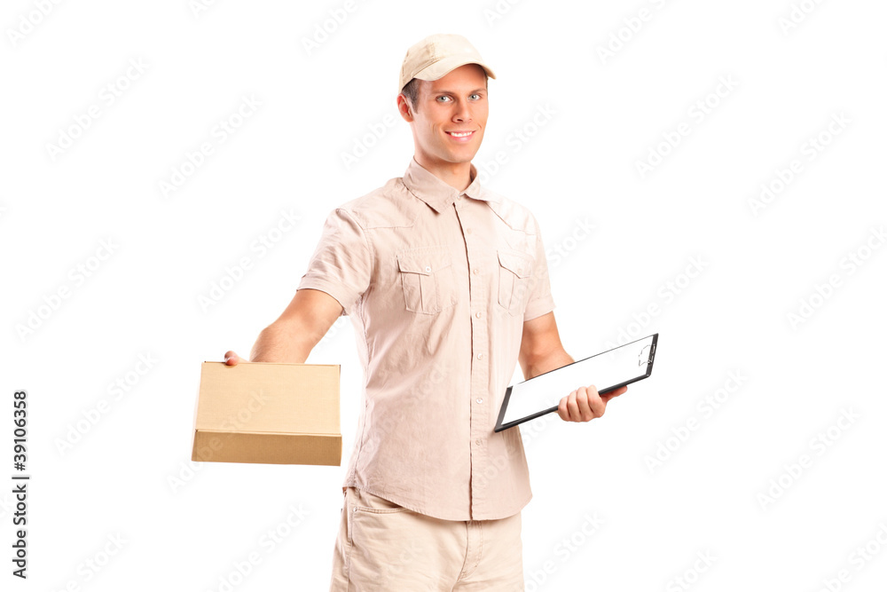 A delivery boy delivering a packet and holding a clipboard A delivery boy delivering a packet and holding a clipboard