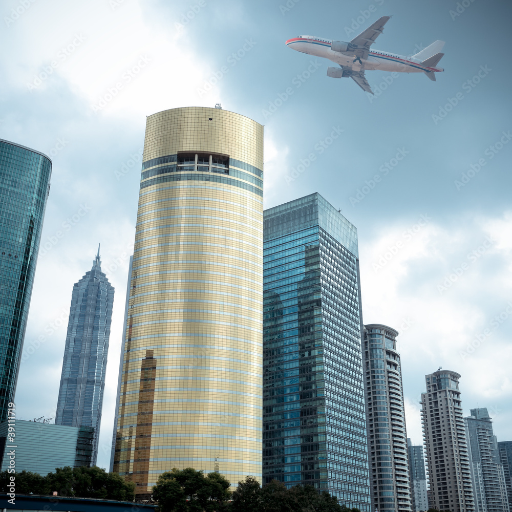 Naklejka premium modern building with airplane