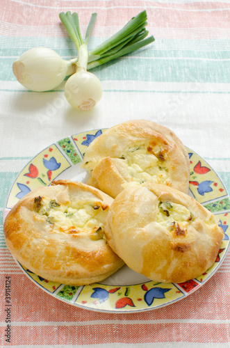 Knishes with farmer cheese and scallions (Jewish pastry) photo