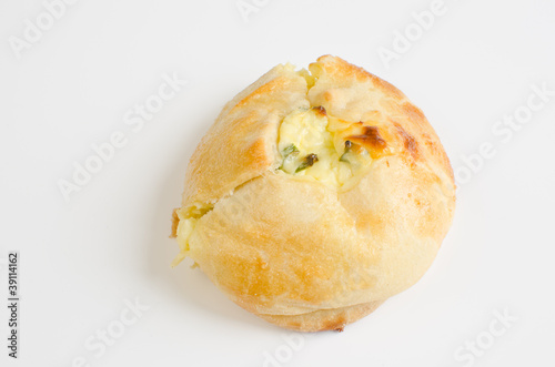 Knish with farmer cheese and scallions (Jewish pastry) photo