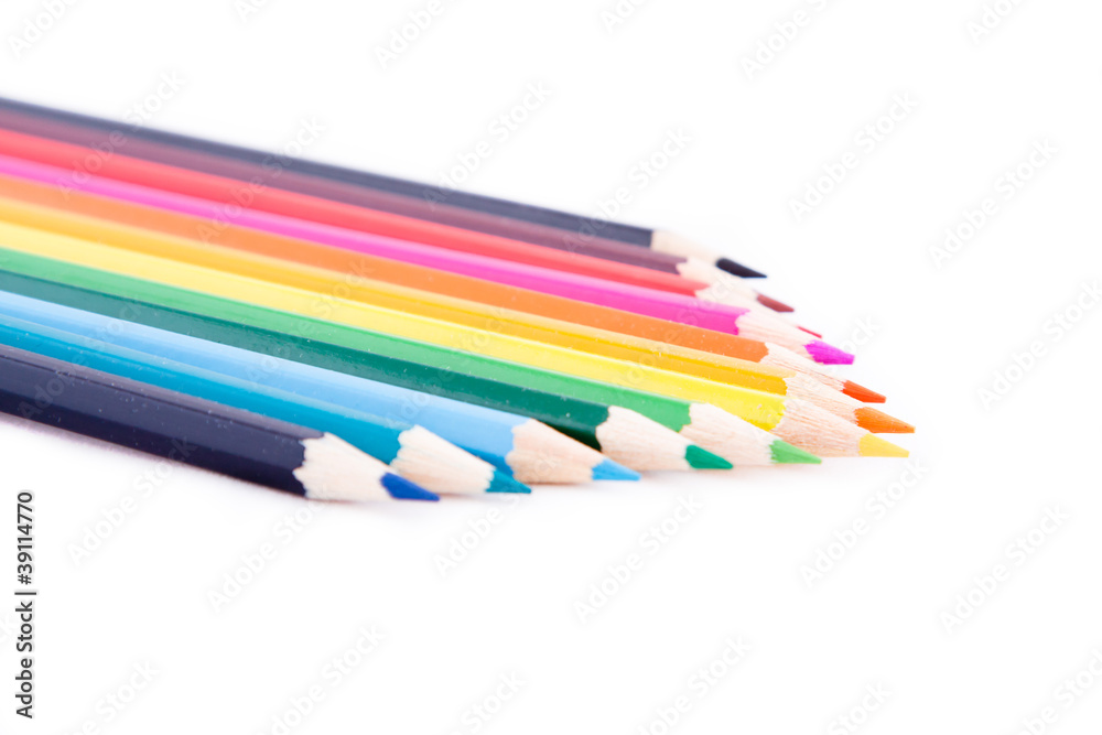 Naklejka premium Color pencils on white isolated background