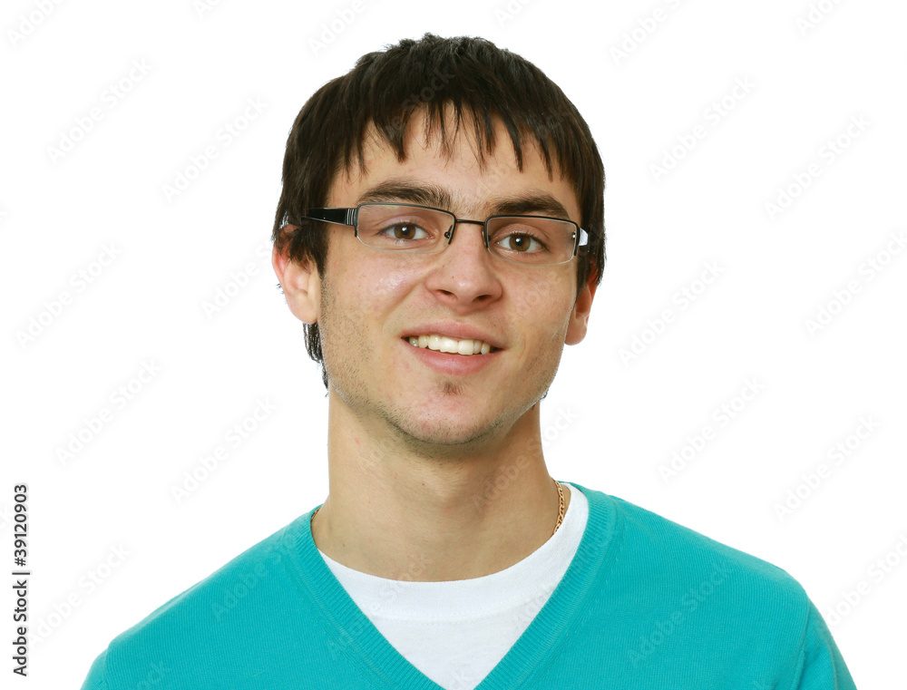 A young man with glasses smiling isolated on a white background A young man with glasses smiling isolated on a white background