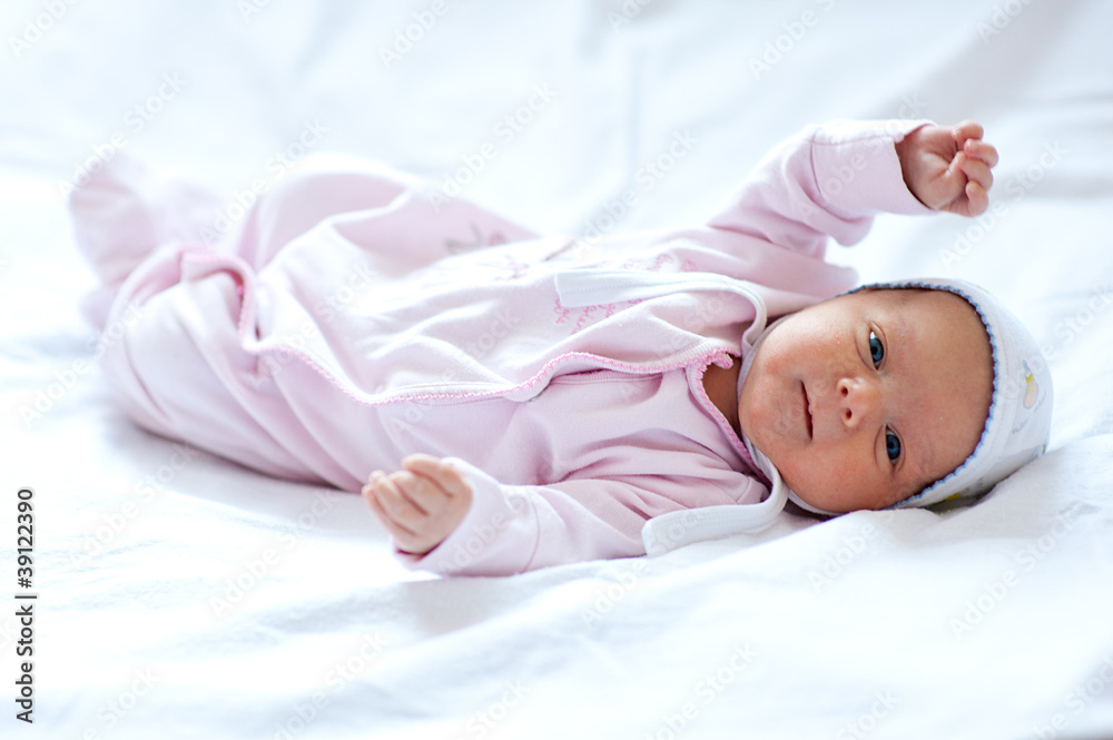Baby girl on the bed Baby girl on the bed