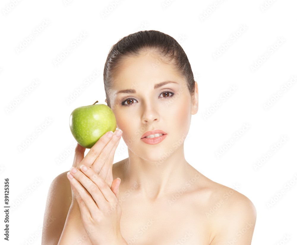 Portrait of a young woman holding a fresh green apple Portrait of a young woman holding a fresh green apple