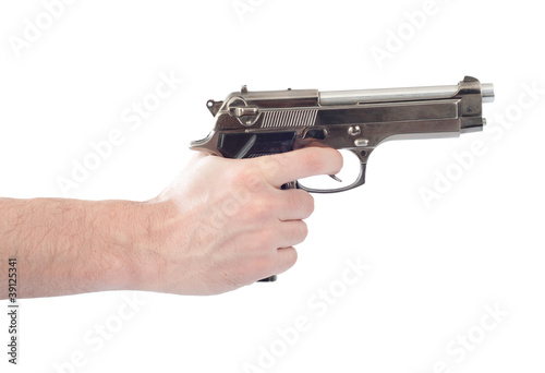 Hand holding a hand gun isolated on white