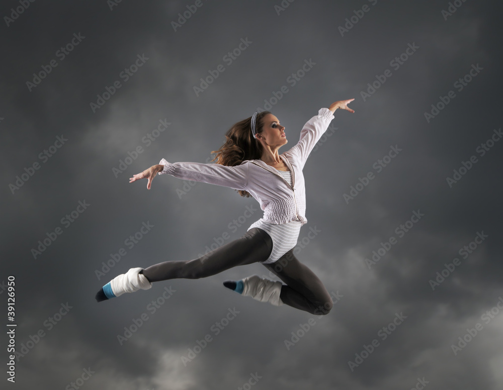 A young and attractive Caucasian dancing woman A young and attractive Caucasian dancing woman
