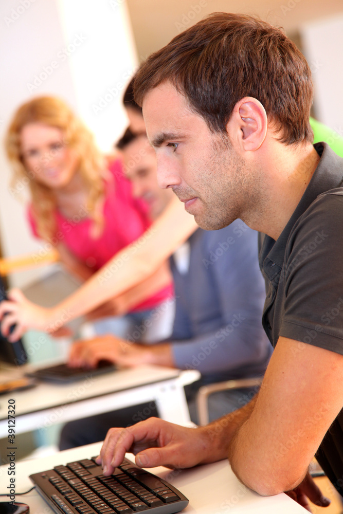 Portrait of young adult attending training class Portrait of young adult attending training class