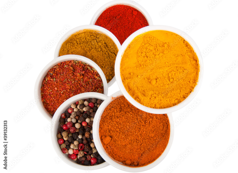 Spices in porcelain plates Spices in porcelain plates