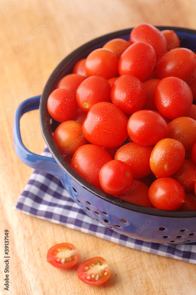 Cherry Tomato’s in a strainer Cherry Tomato’s in a strainer