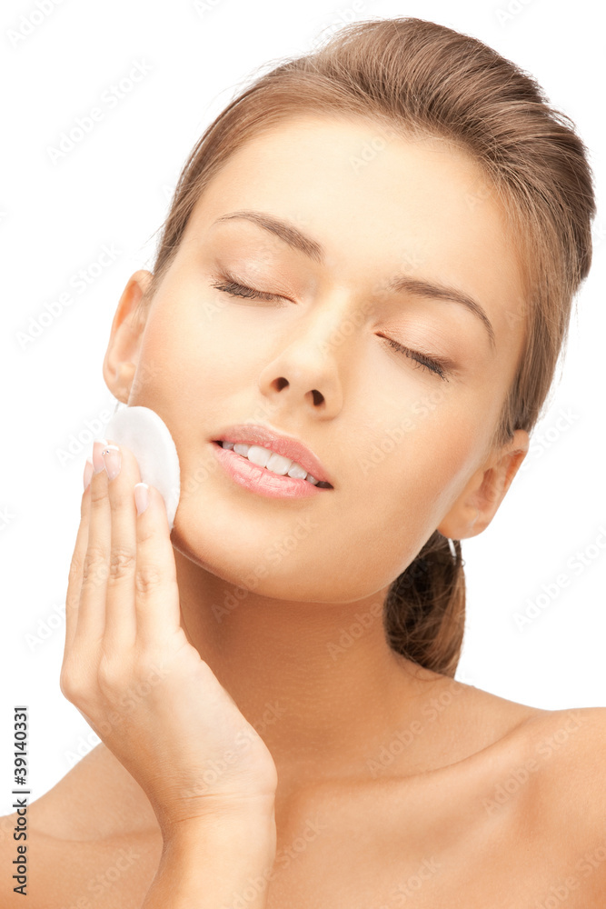 beautiful woman with cotton pad