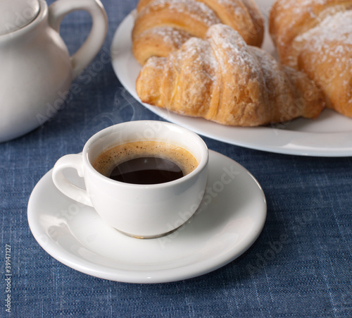 coffee cup with croissant