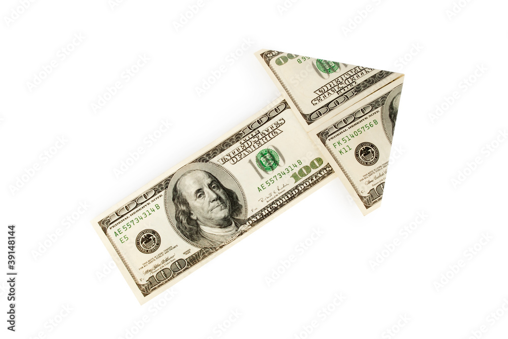 Arrow made of dollars on white background Arrow made of dollars on white background
