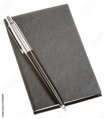 notebook and pen isolated photo