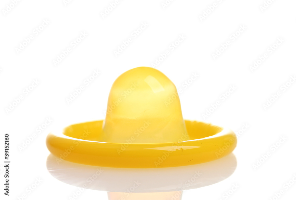 Yellow condom isolated on white Yellow condom isolated on white