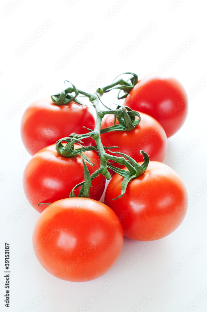 Branch of ripe cherry tomatoes close up Branch of ripe cherry tomatoes close up