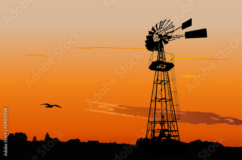 Vintage water pumping windmill