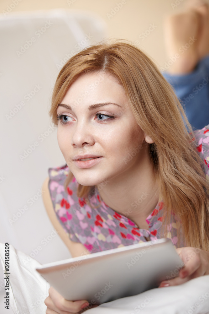 woman holding a touchpad pc woman holding a touchpad pc