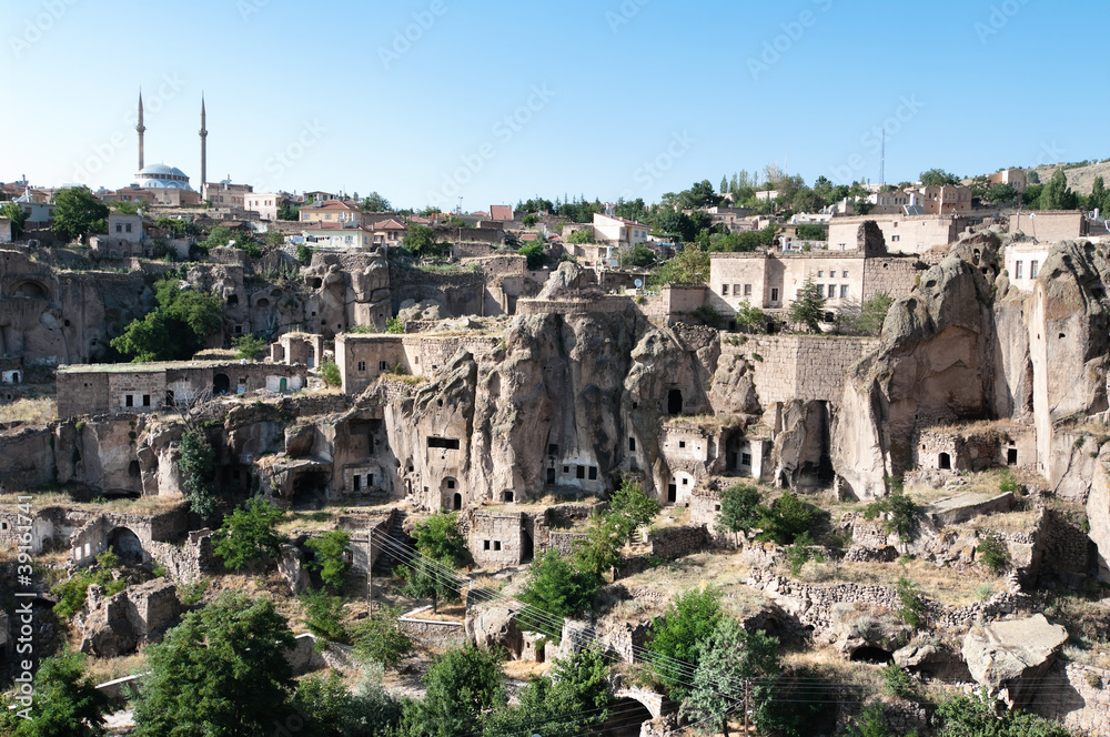Obraz premium Rock Formation and Cave Houses in Cappadocia - Turkey