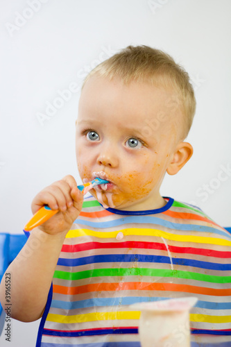 Cute Infant Eating Messily