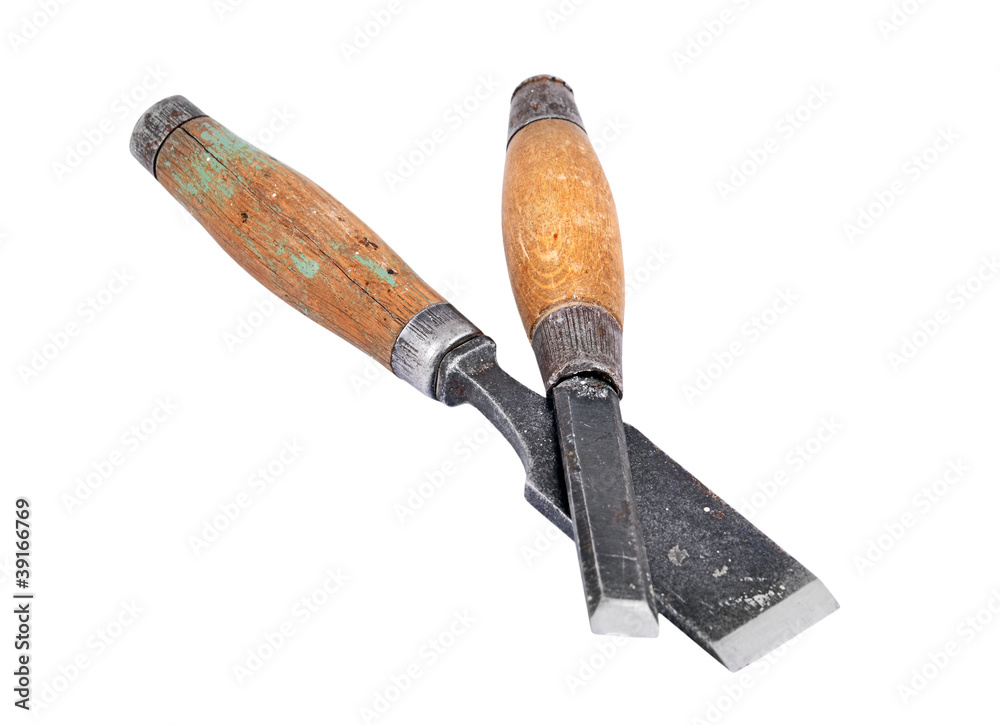 Old and rusty chisel, isolated on white background