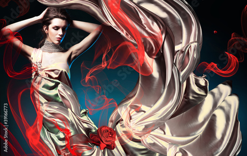 beautiful woman in long fairy dress and red abstract
