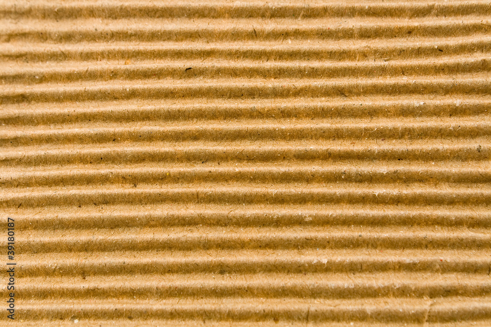 Texture of brown corrugate cardboard Texture of brown corrugate cardboard