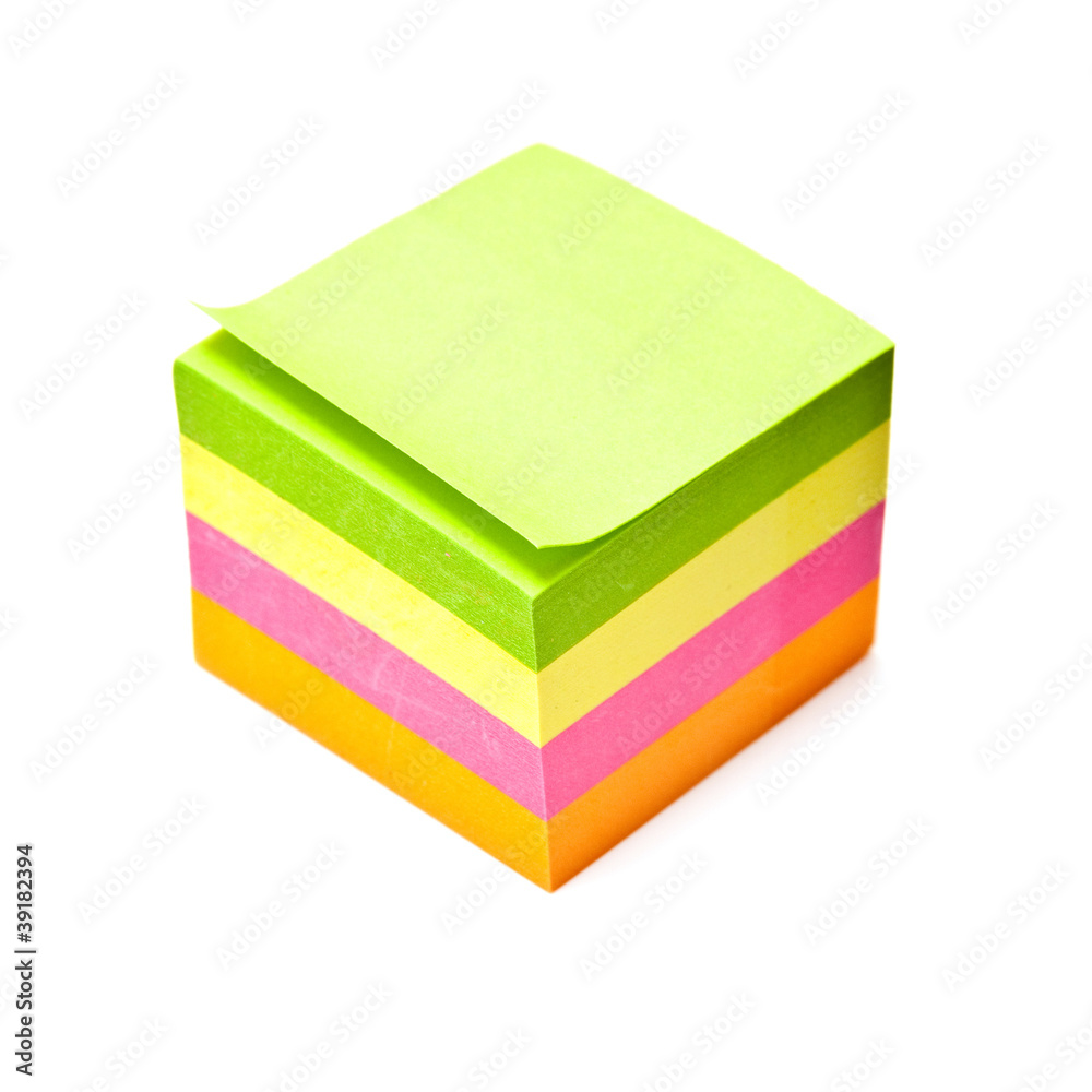 Post-it note isolated on a white studio background.