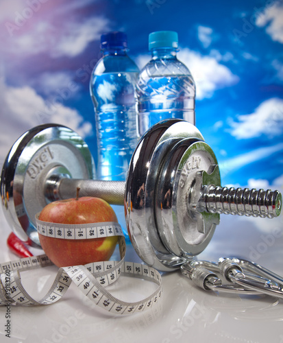 fitness barbell water and fruits