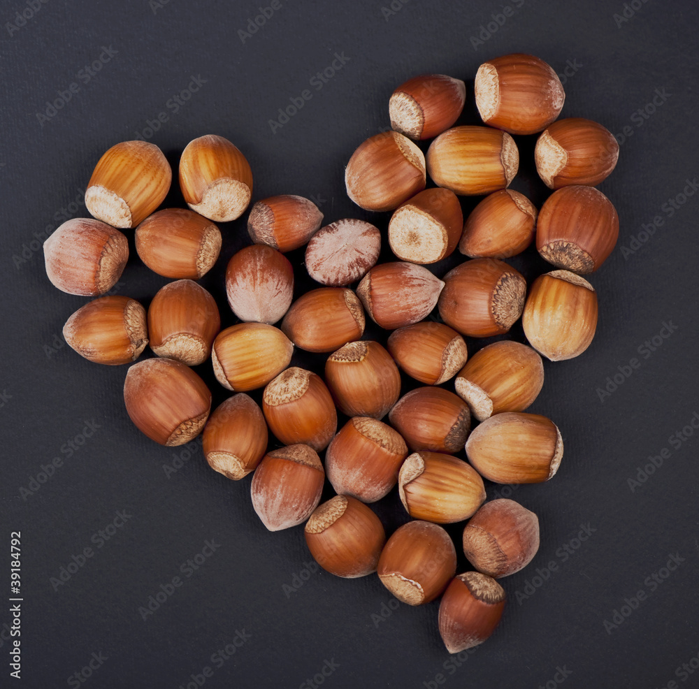 heart of hazelnut on a black background heart of hazelnut on a black background