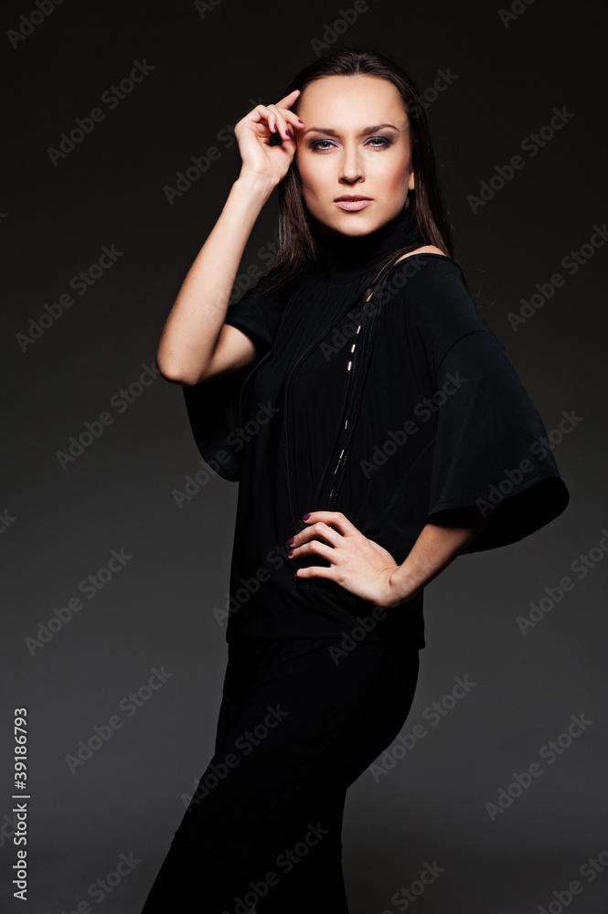 attractive model over dark background attractive model over dark background
