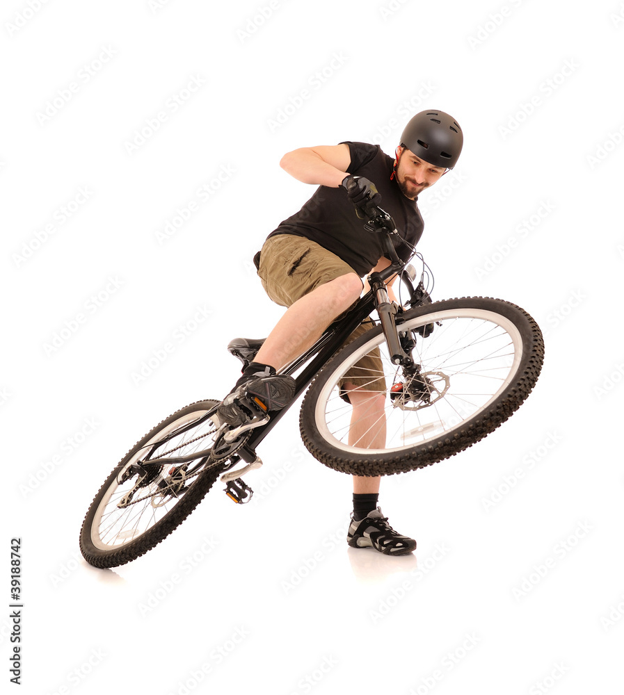 Naklejka premium The bicyclist isolated on white.