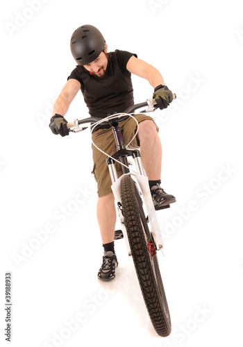 The bicyclist isolated on white.