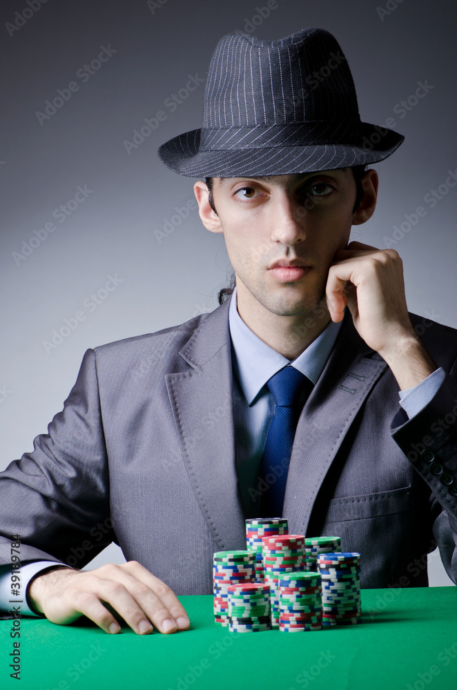 Casino player playing with chips Casino player playing with chips