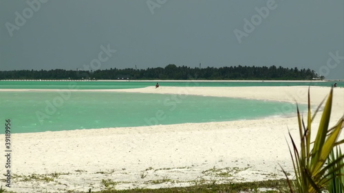 wild beach with white coral sand photo