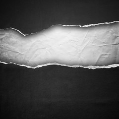 riped black paper background