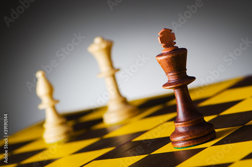 Chess concept with various pieces photo