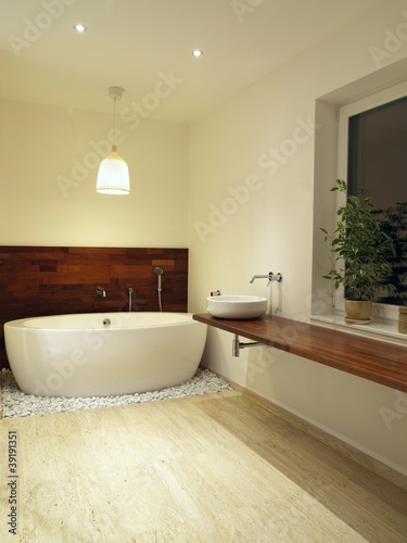 Freestanding bath in a modern bathroom interior