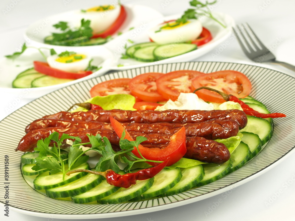 Juicy roasted sausages with crispy vegetables Juicy roasted sausages with crispy vegetables