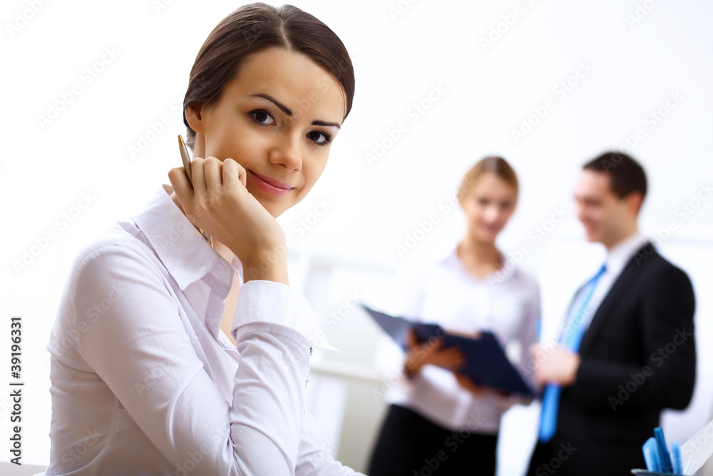 Portrait of a business woman in office Portrait of a business woman in office