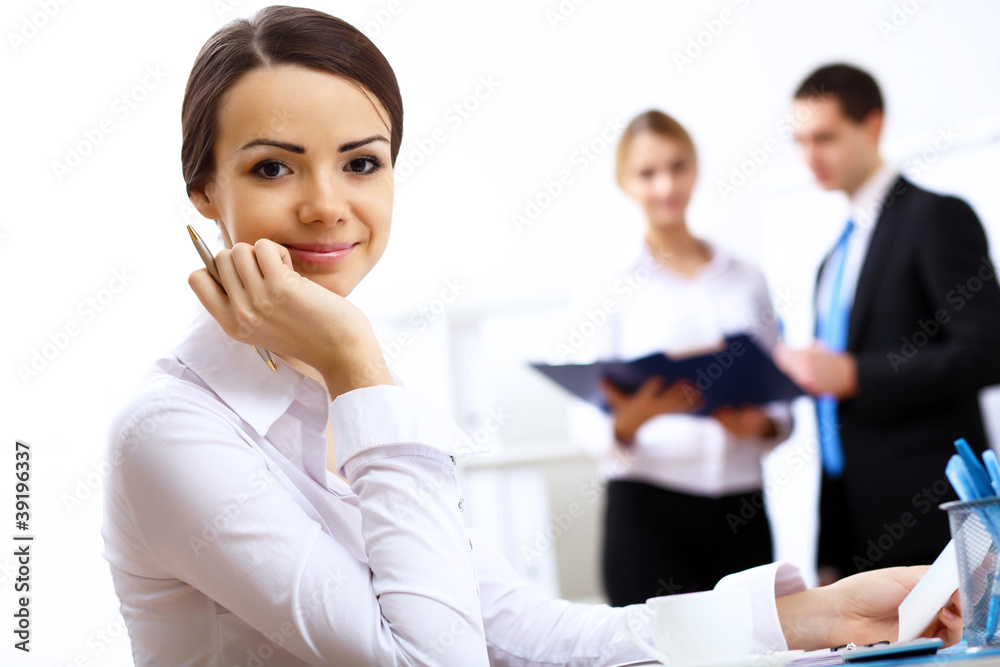 Portrait of a business woman in office Portrait of a business woman in office