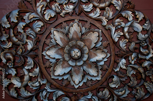 The Old carving wood ornament of flower pattern thai style