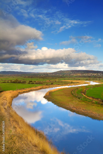 Idyllic scenery of sky reflected in Shannon river