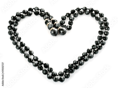beads as heart isolated on white background