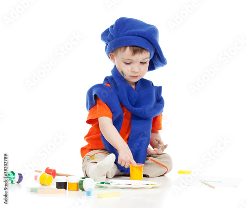 young artist child with paints