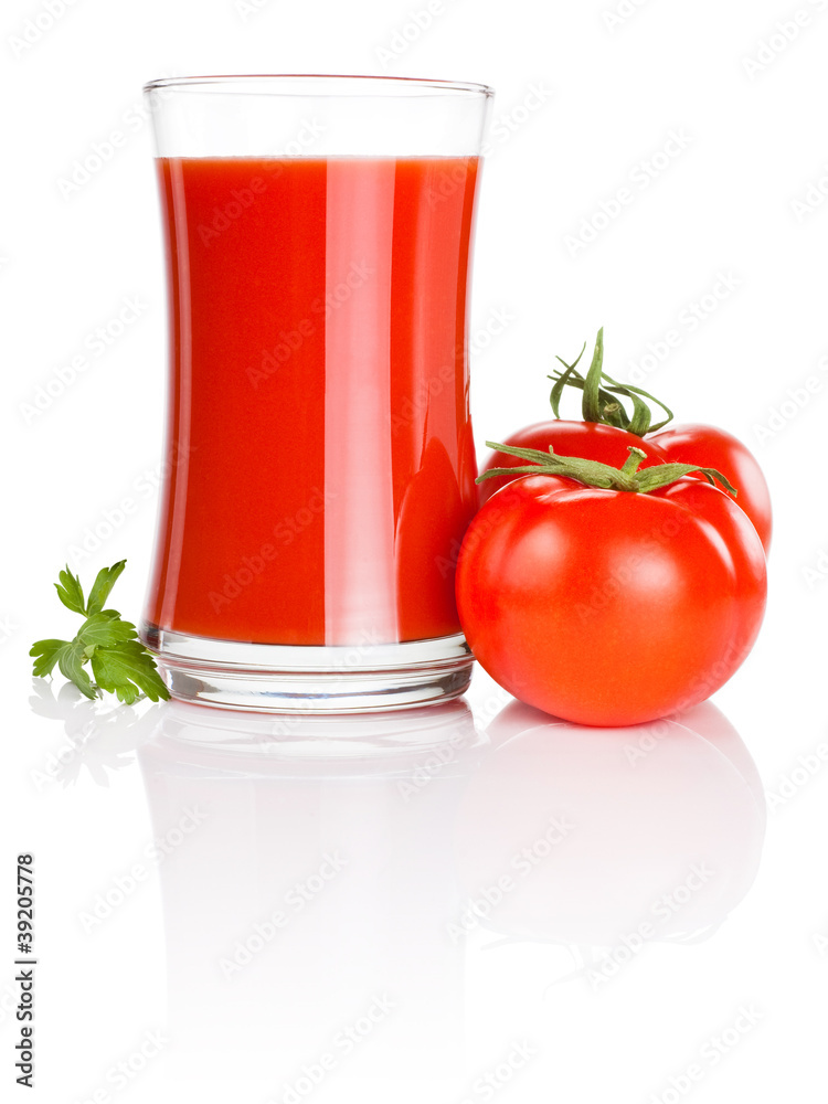 Glass of fresh tomato juice, two tomatoes and leaf parsley Isola Glass of fresh tomato juice, two tomatoes and leaf parsley Isola